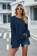 Peacock blue round-neck dropped-shoulder slit sweater with ribbed cuffs and hem