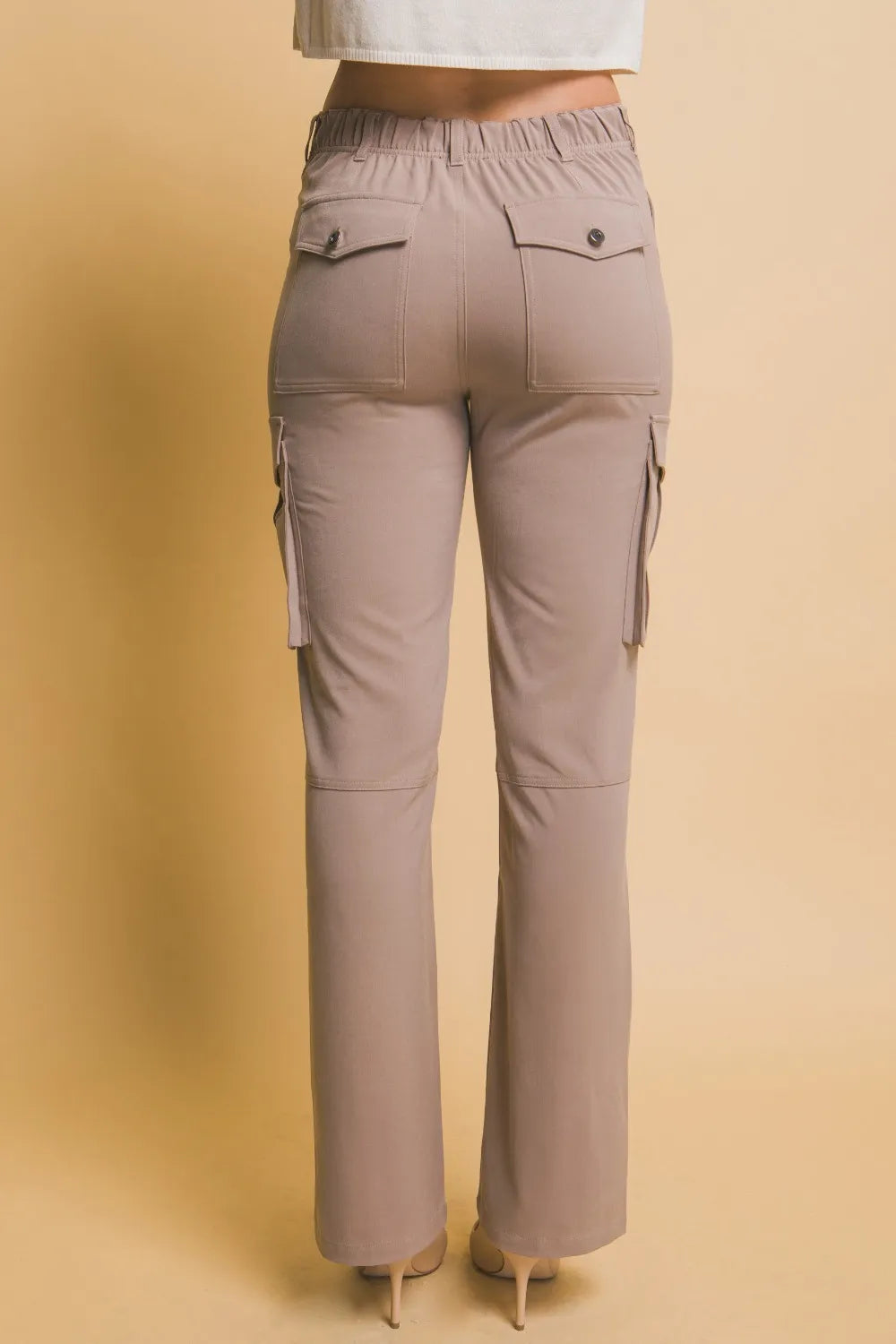 Taupe high-rise cargo pants with back pockets and side cargo panel pockets