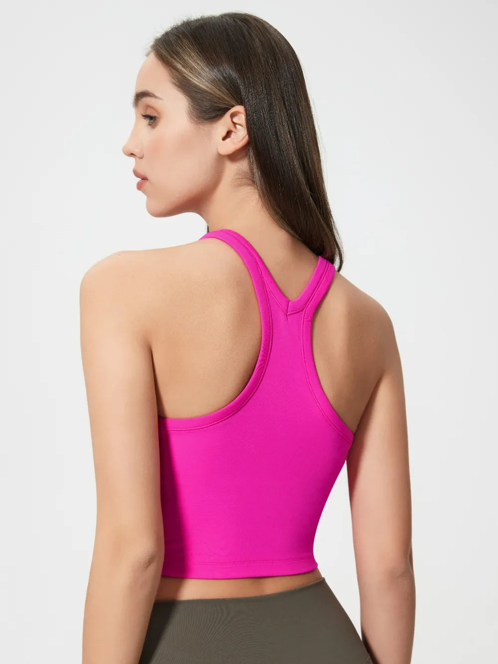 Hot pink racerback active tank with scoop neckline, back view.