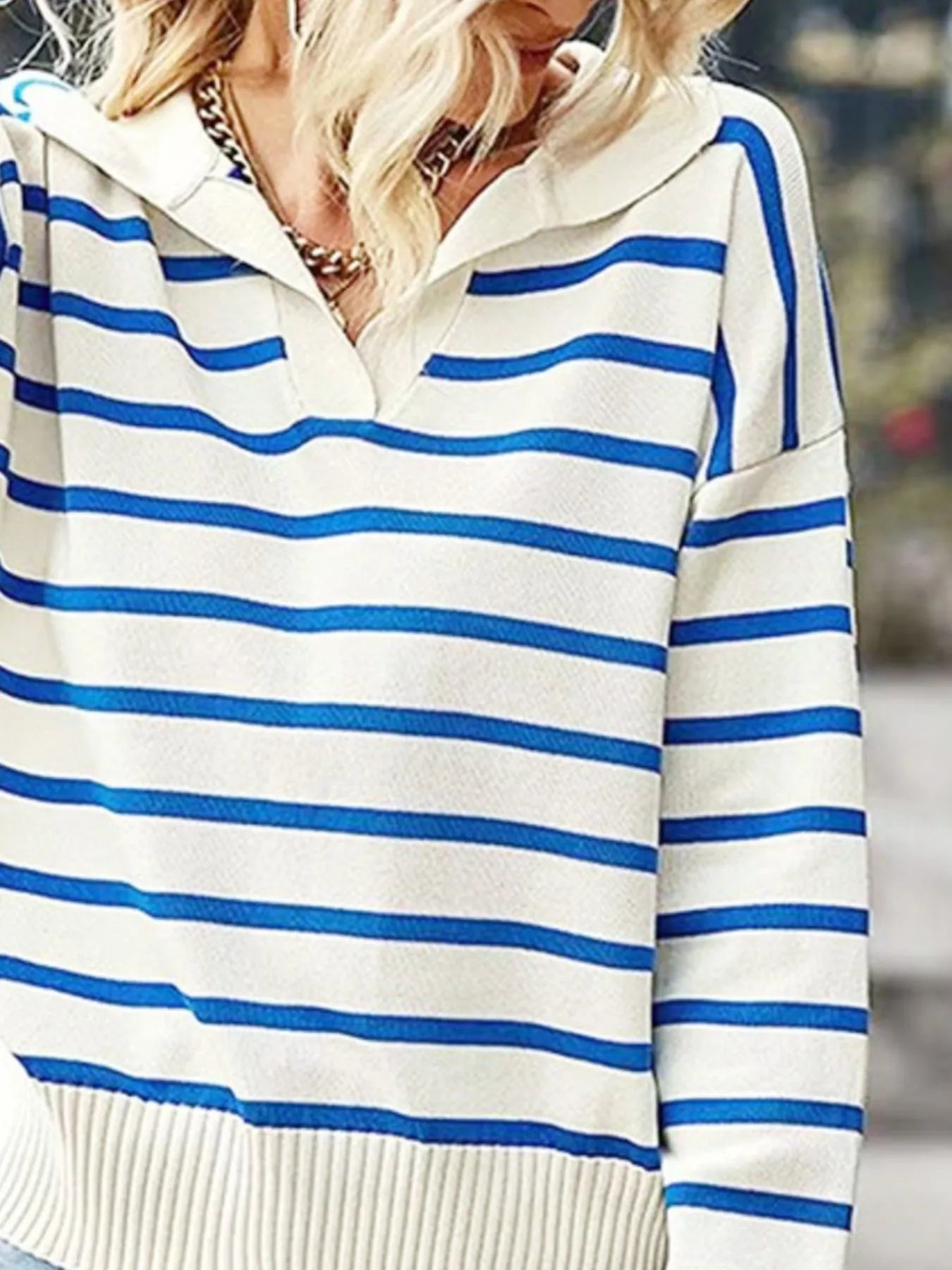 Striped long-sleeve sweater with polo collar, white knit with blue horizontal stripes