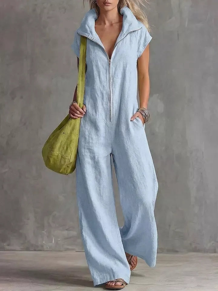 Light blue sleeveless zip-front pocketed women’s jumpsuit with collared neckline