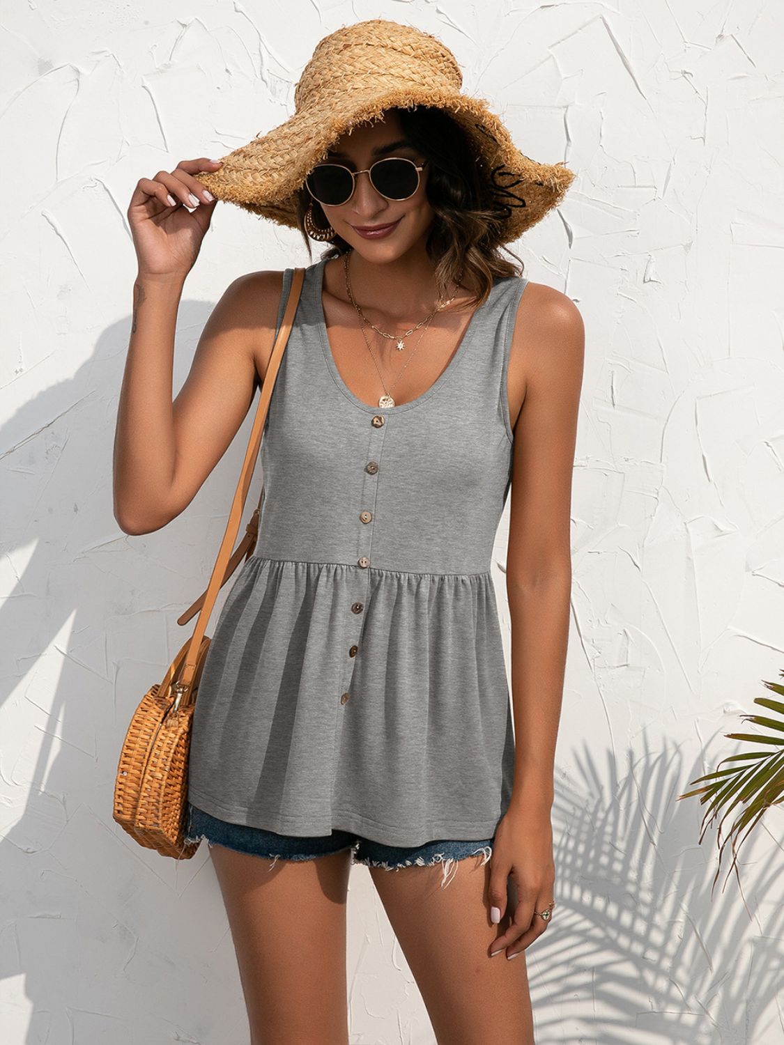 Gray scoop neck tank with decorative buttons, gathered waist, sleeveless