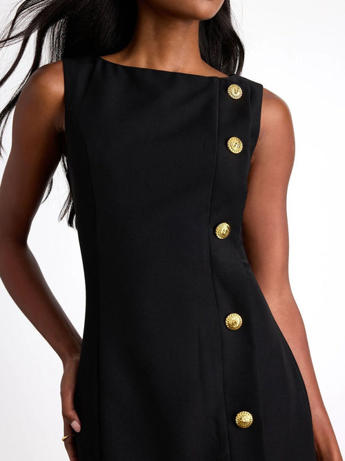 Black sleeveless mini dress with gold buttons along side panel
