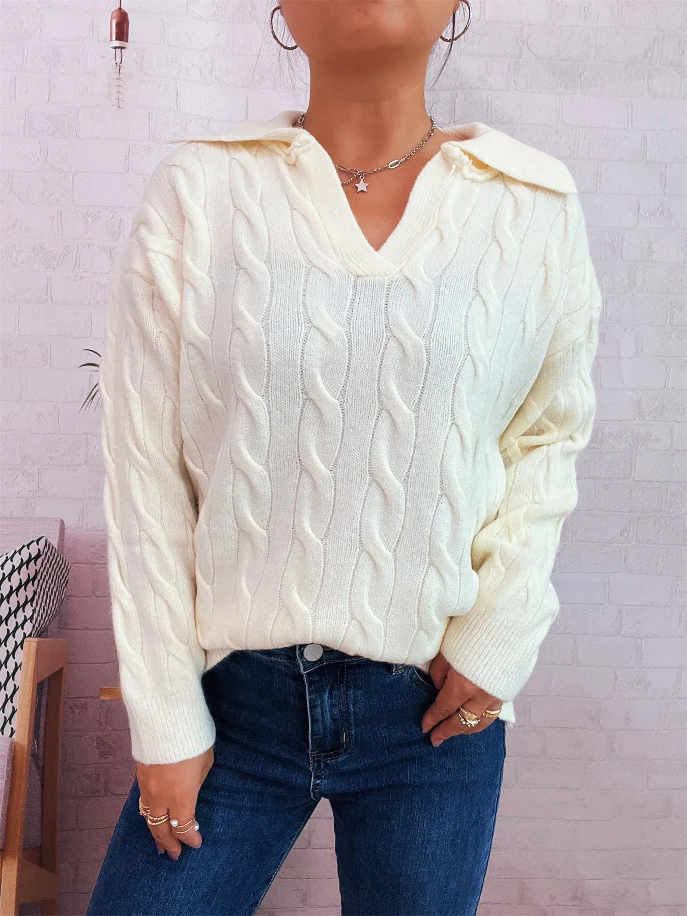Cream cable knit Johnny-collar sweater, raised cable pattern, ribbed cuffs and hem