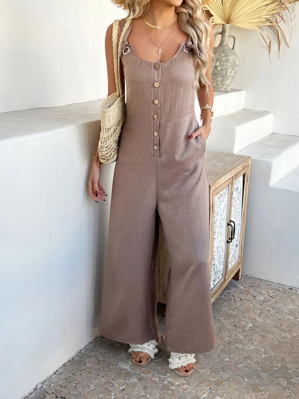 Taupe button-front knotted-strap wide-leg jumpsuit with square neckline