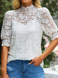 White lace short-sleeve blouse with high neck and floral lace pattern