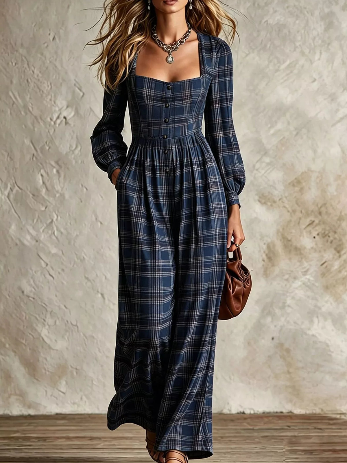 Navy plaid square-neck long-sleeve jumpsuit with button front and tiered waist