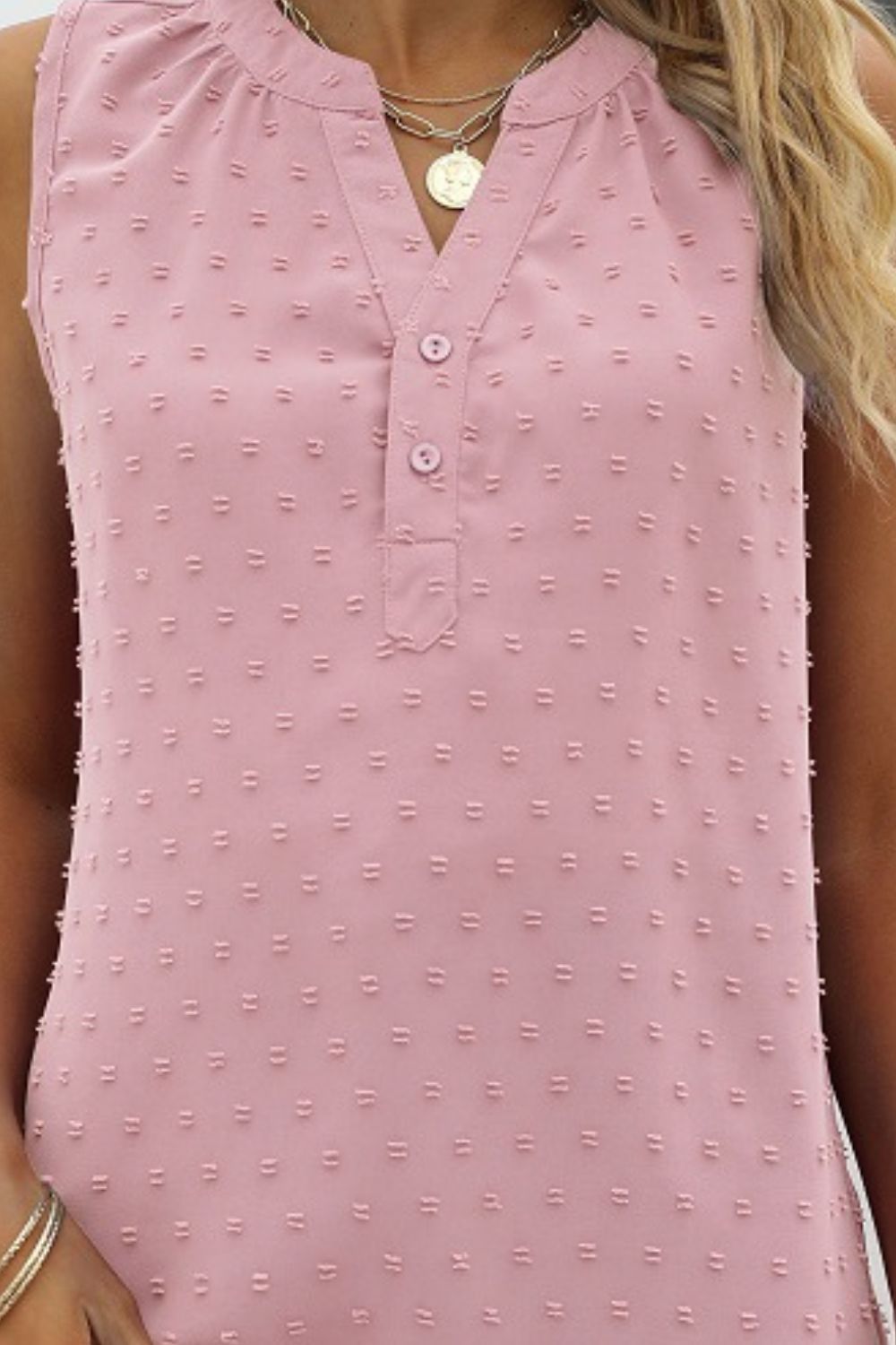 Blush pink swiss-dot notched-neck tank with button-front