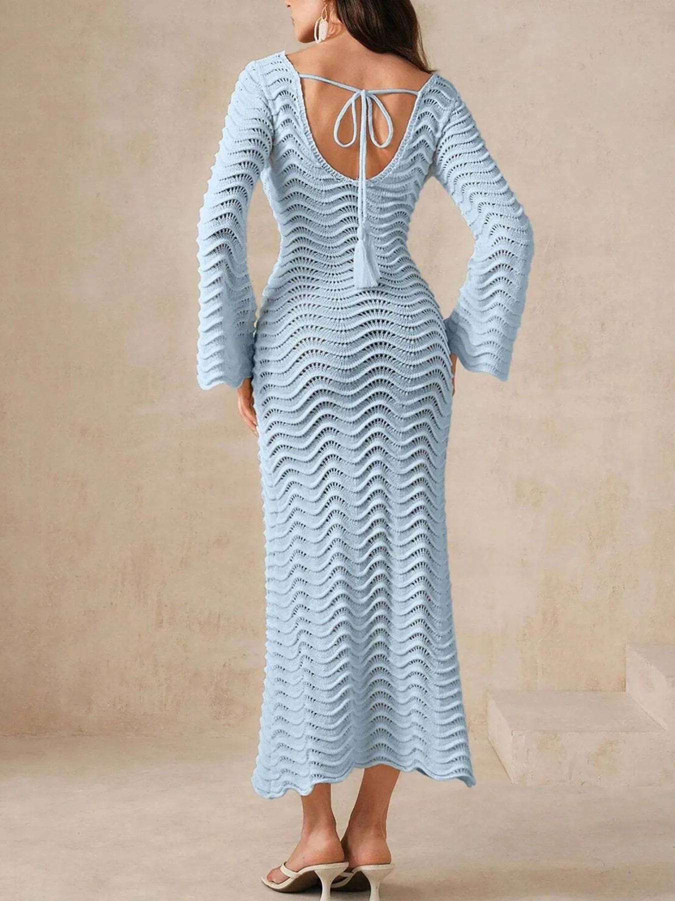 Blue openwork crochet maxi knit dress, long sleeves, wavy pattern, tie-back detail