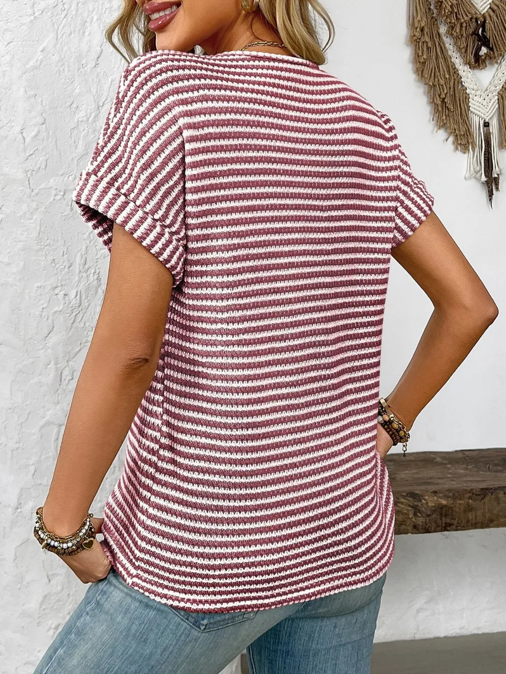 Red and white striped short-sleeve V-neck t-shirt, crew back view with curved hem