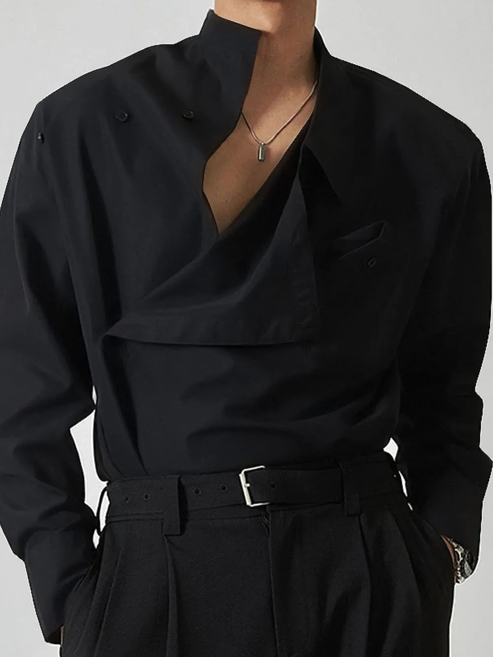 Black asymmetrical long sleeve shirt with V-wrap front, mandarin collar, chest pocket