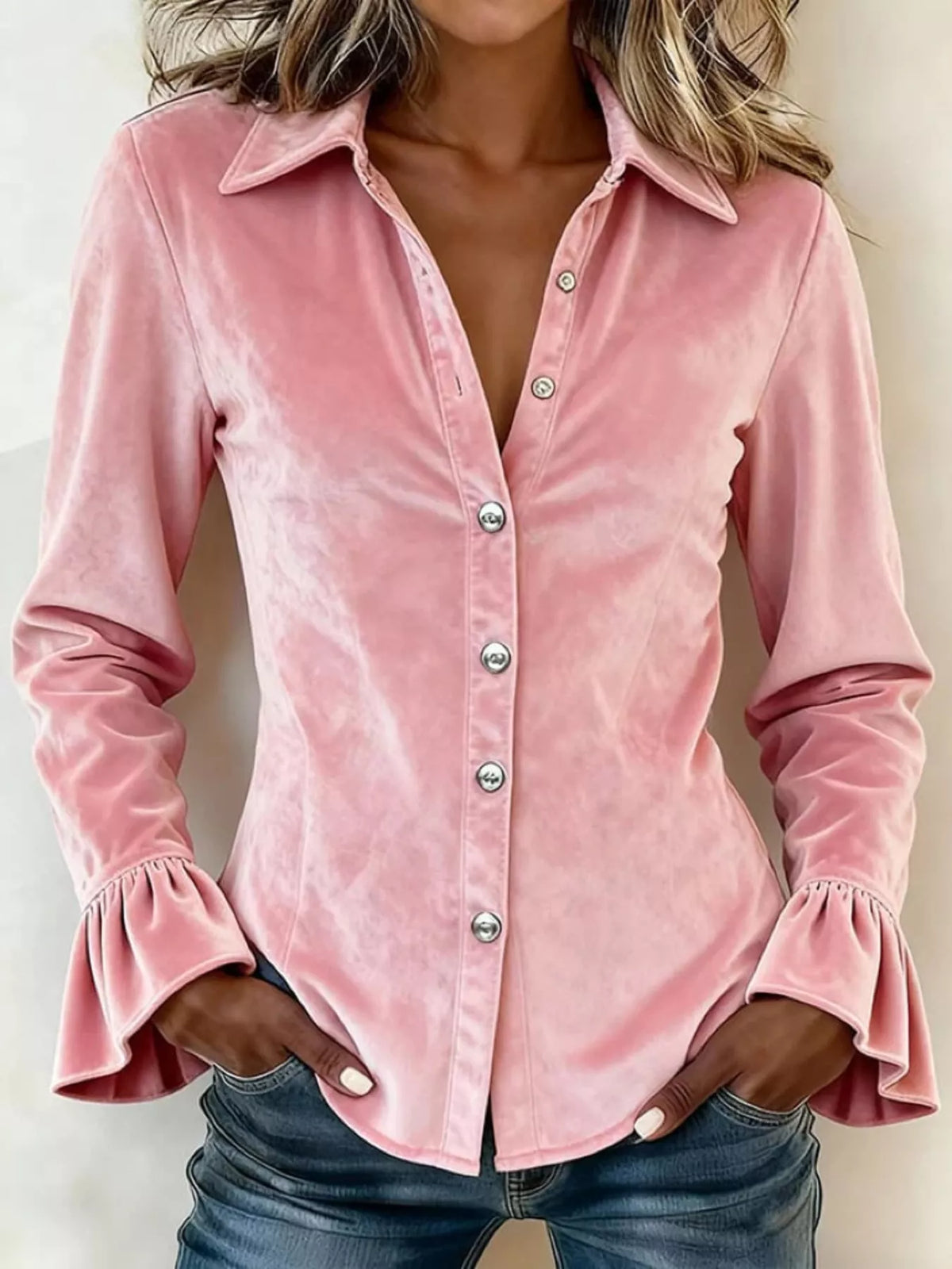 Pink velvet button-down top with ruffle cuffs and silver buttons