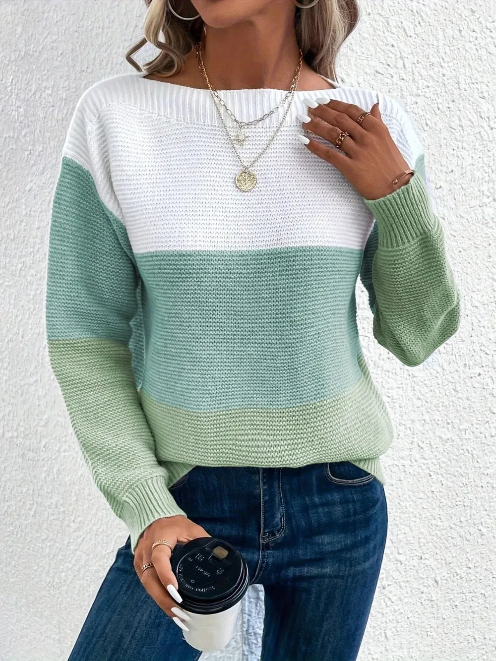 Boat-neck color block sweater in white with mint green stripe across the chest