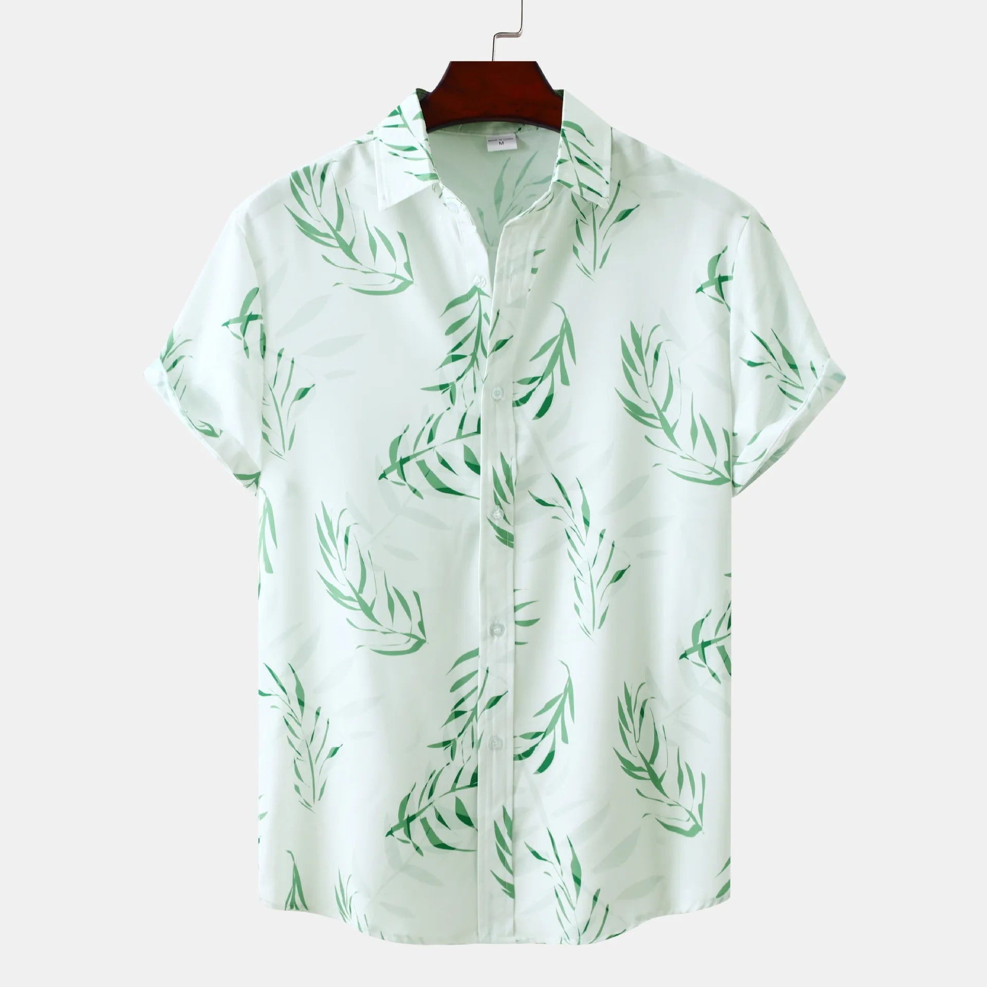 Men's plus size printed short-sleeve casual shirt, light green base with leaf pattern