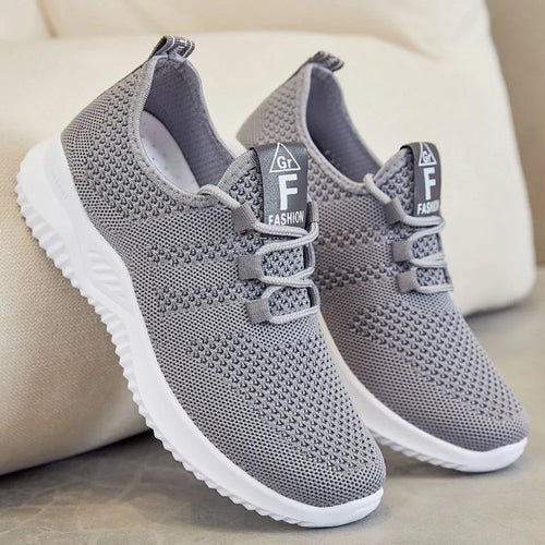 Gray knit mesh lace-up athletic sneakers with white rubber sole