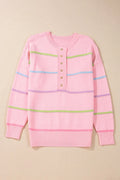 Blush pink striped knit sweater with half-button placket and round neckline, pastel bands in green/blue
