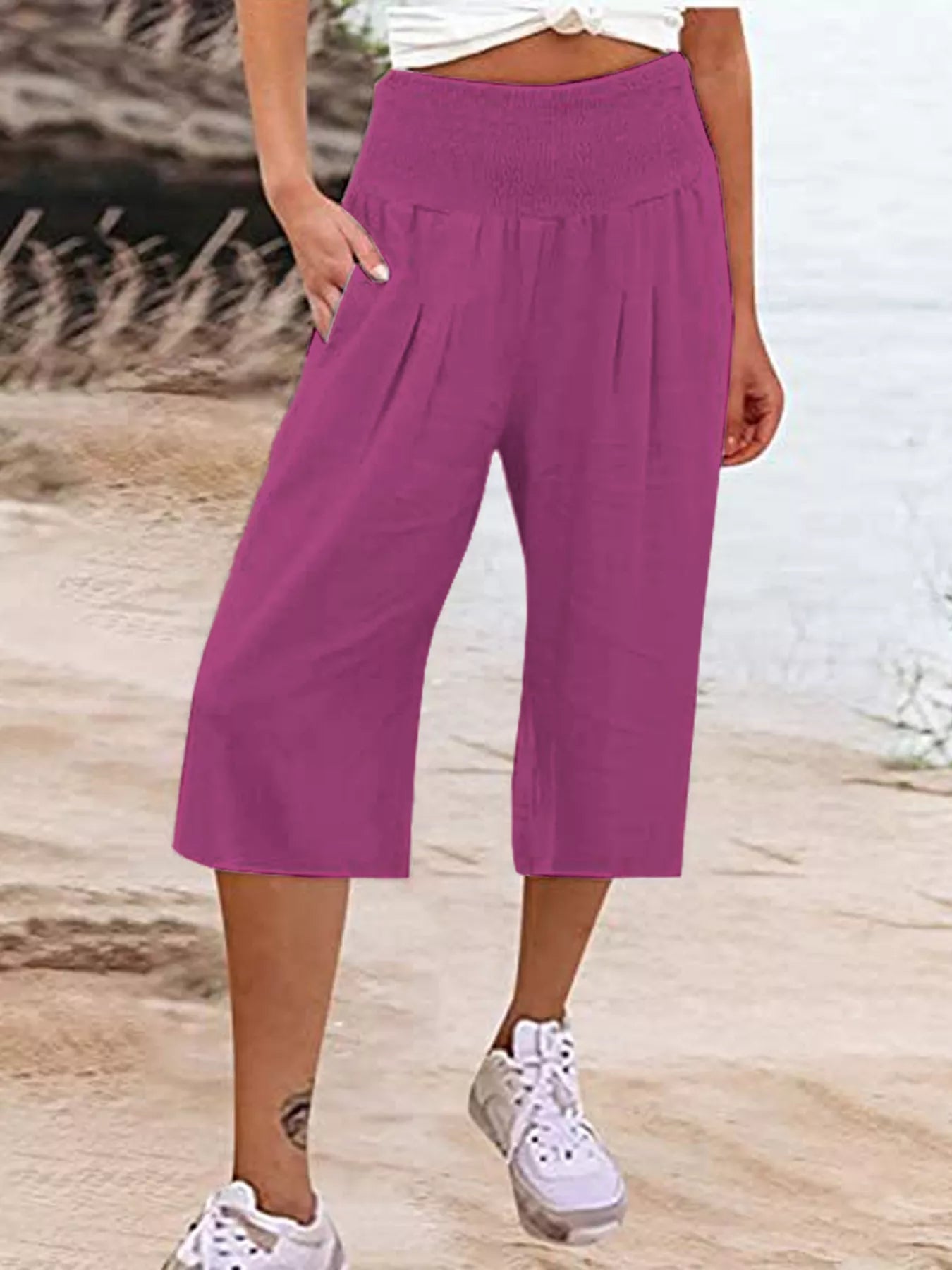 Smocked wide-leg capri pants in fuchsia purple with elastic smocked waistband