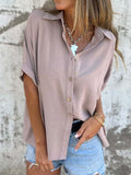 Dusty pink collared half-sleeve button-up shirt with front button placket