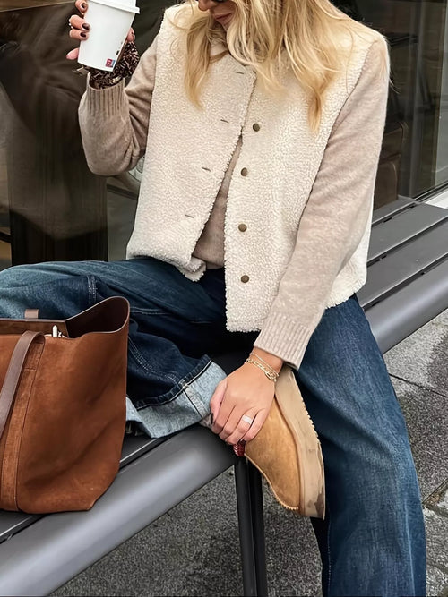 White sherpa button-down vest coat with four front buttons and stand collar