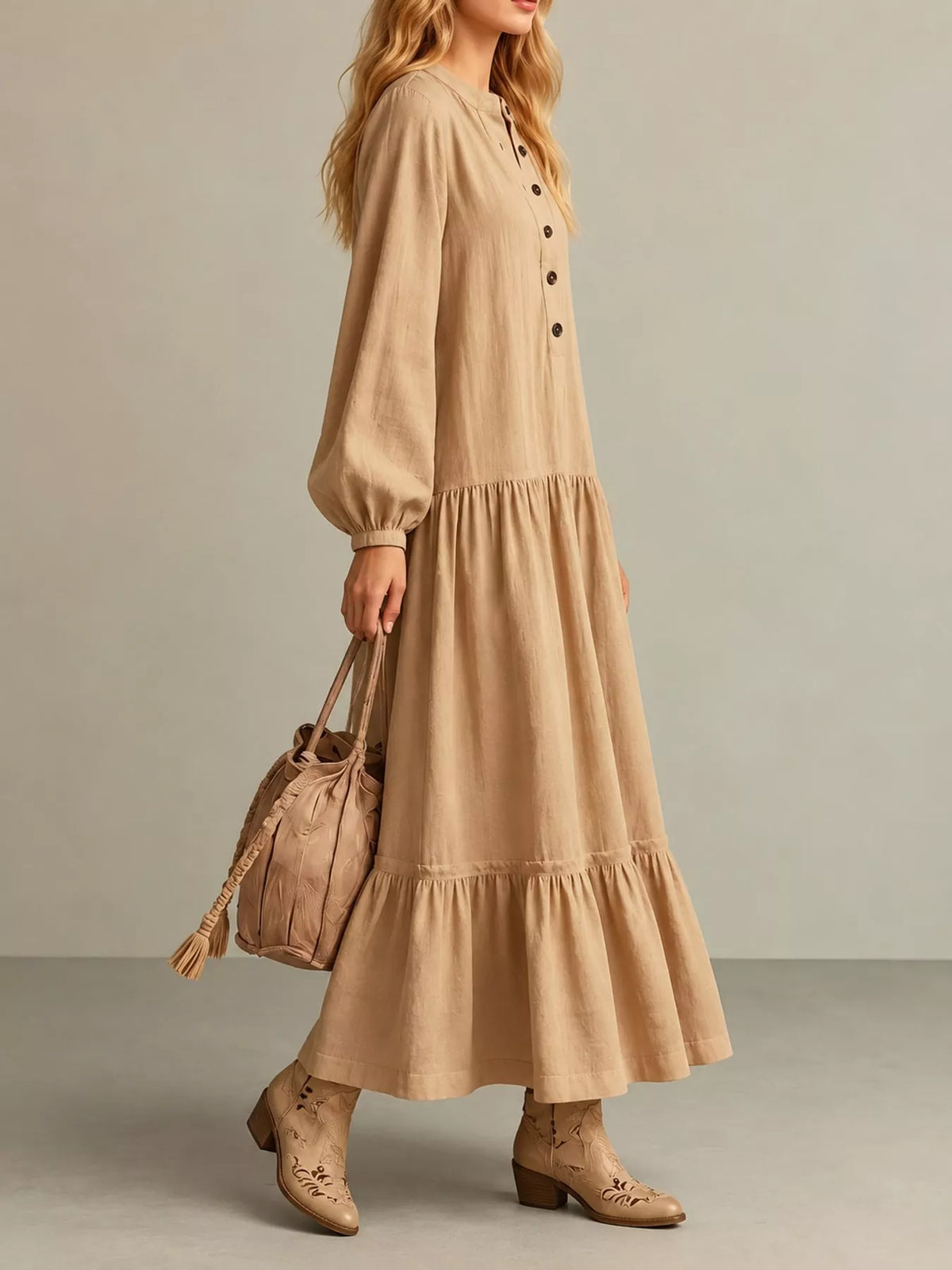 Light tan tiered maxi dress with vertical button placket and gathered skirt tiers
