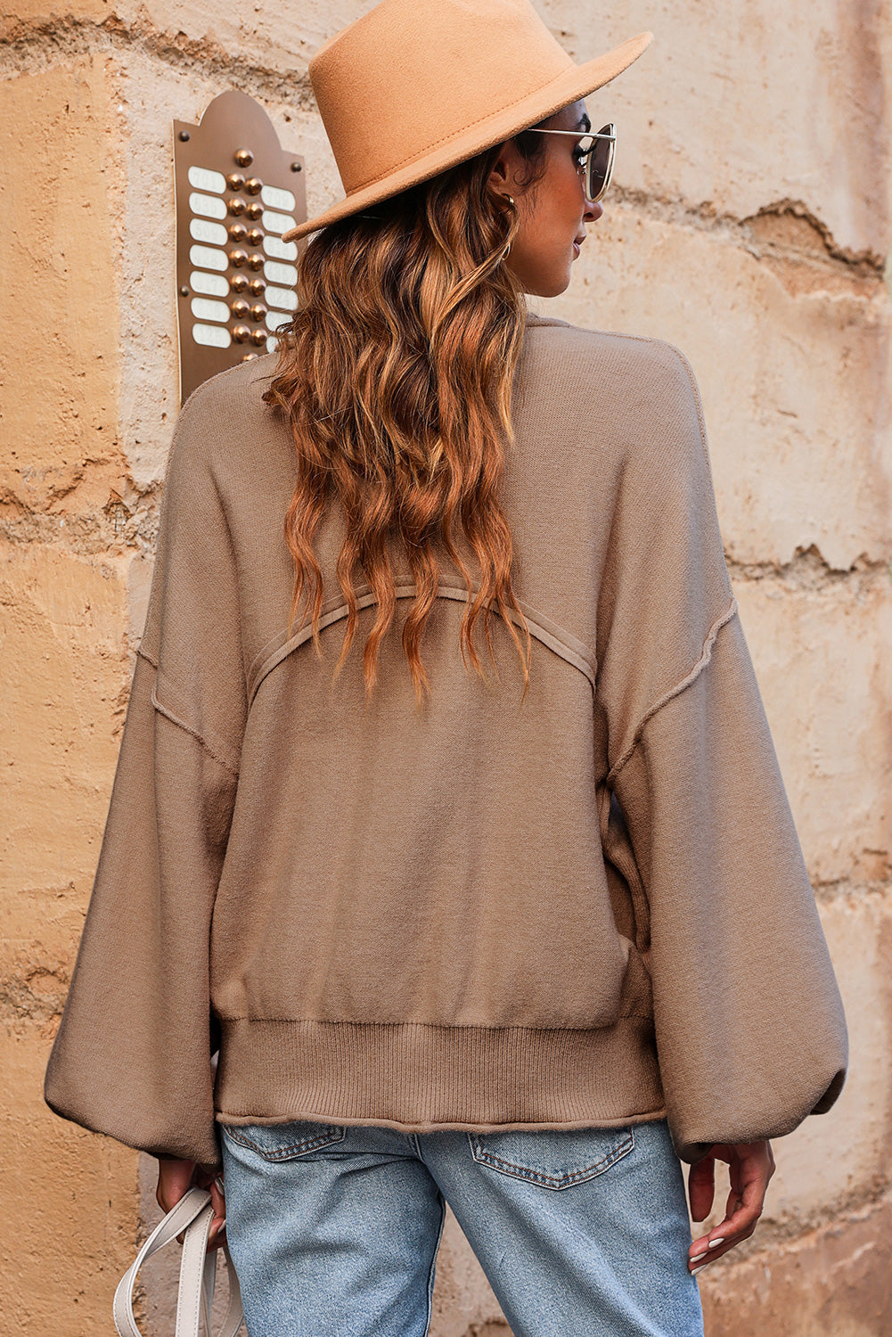 Camel round-neck dropped-shoulder sweater with long sleeves and front pocket detail