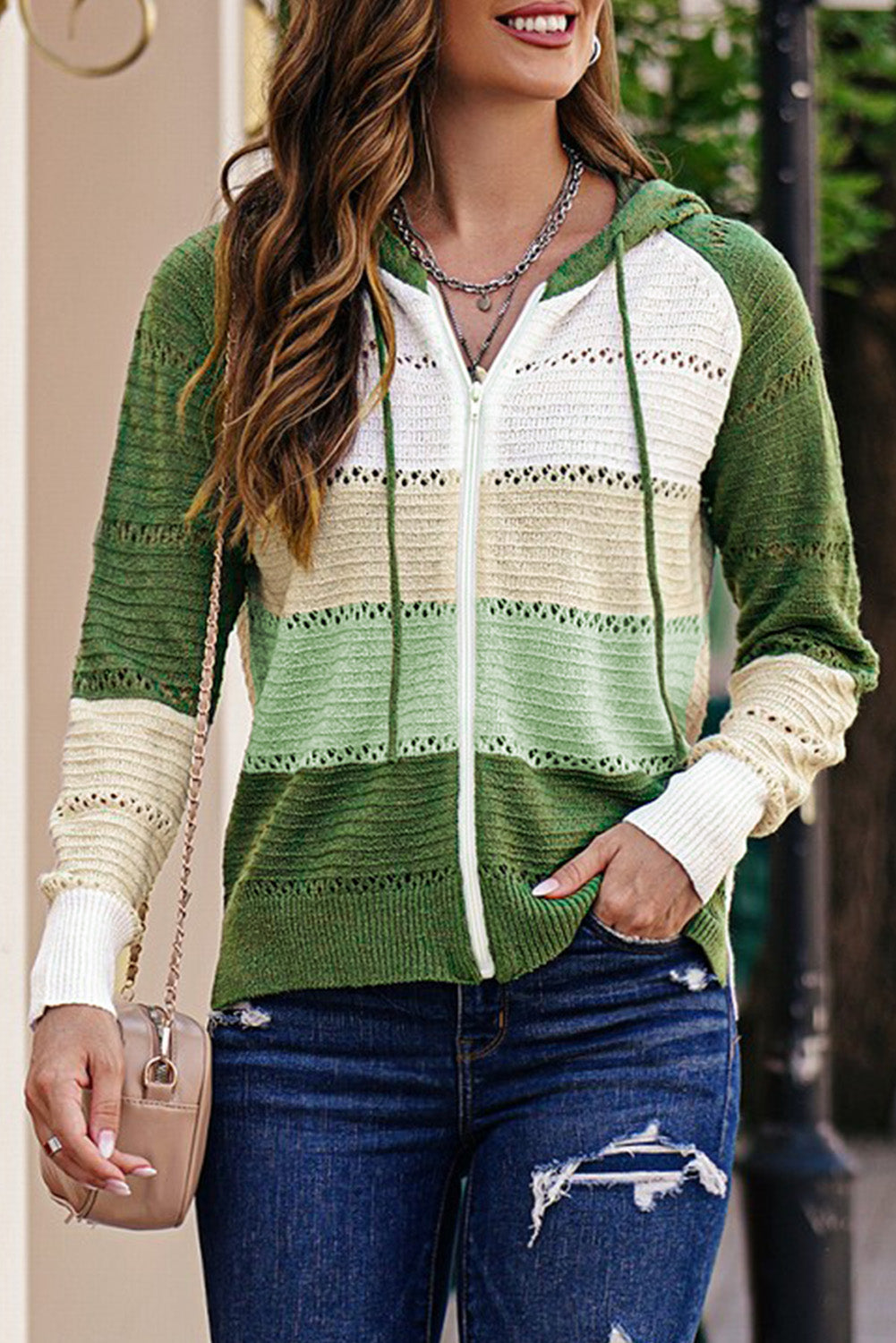 Zip-up hooded cardigan in green and cream with striped openwork knit, raglan sleeves