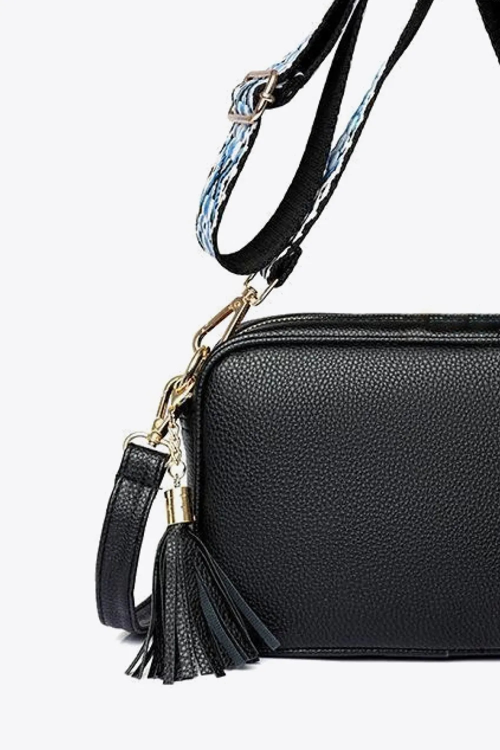 PU leather tassel crossbody bag, black side view with tassel and chain shoulder strap