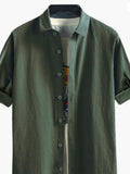 Men's army green short-sleeve button-up shirt with pointed collar and front buttons