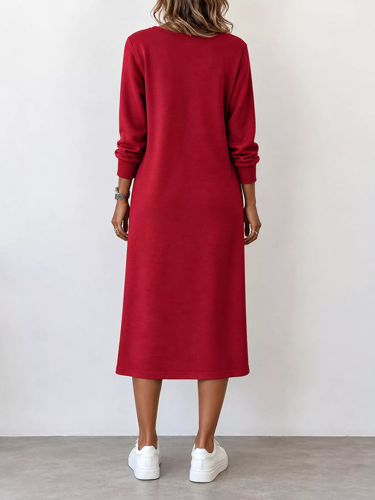 Red long-sleeve midi dress, back view; V-neck style with square patch