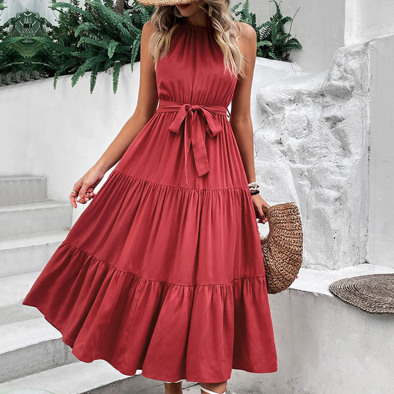 Burgundy halter tiered midi dress with knotted waist tie and flowing tier skirt