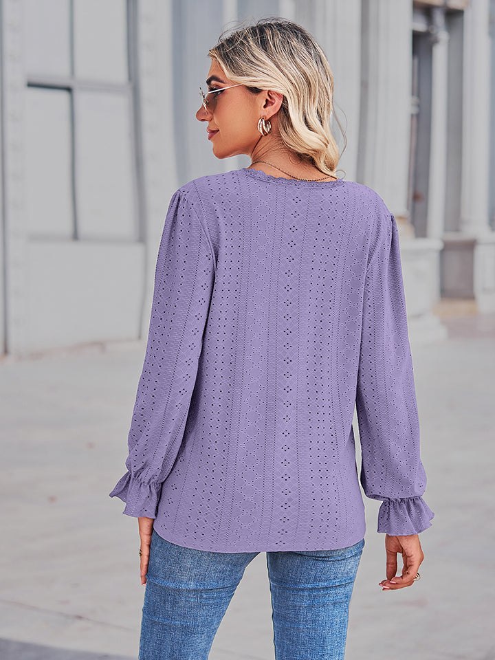 Lavender eyelet blouse with long ruffled sleeves and gathered cuff details