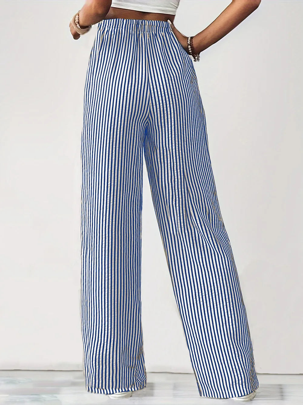 Striped elastic waist drawstring pants in blue and white, wide-leg full view