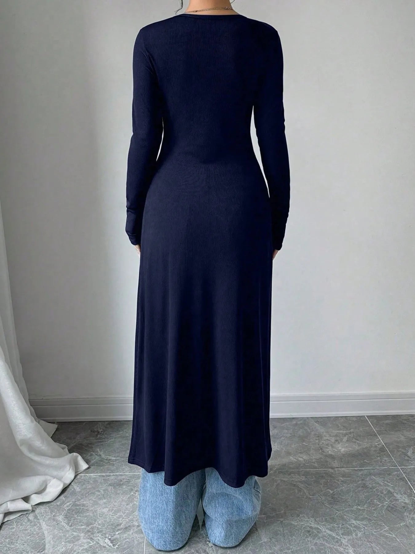 Longline cardigan in dark blue, back view with long sleeves and long hem