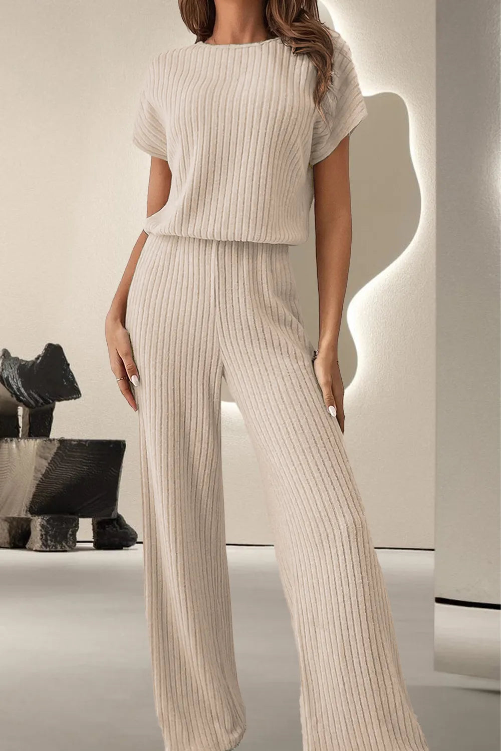 Cream ribbed knit round-neck short-sleeve jumpsuit with wide legs