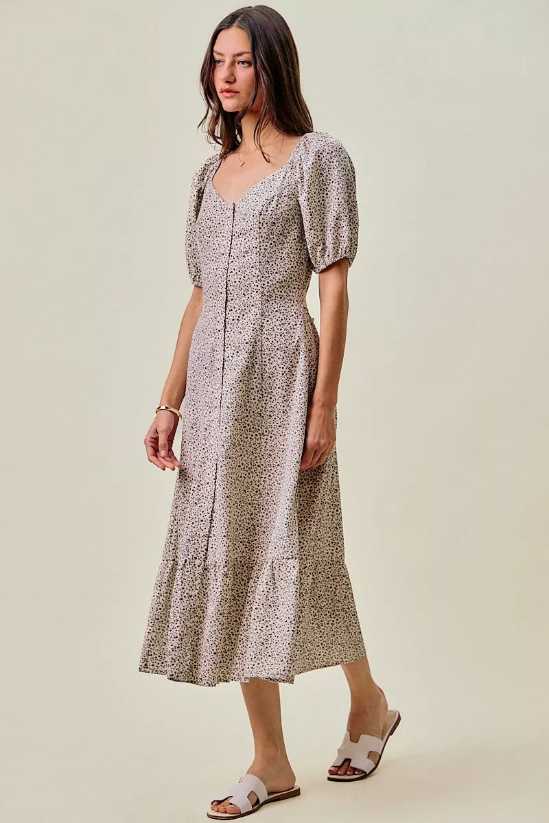 Ditsy floral maxi dress in off white/black with square neckline, puff sleeves, and elastic waist