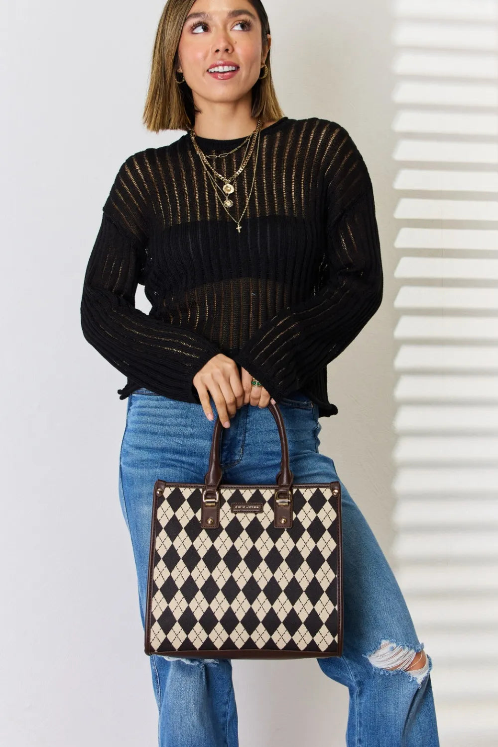 Argyle-pattern PU leather handbag with top handles, cream-and-black diamond print