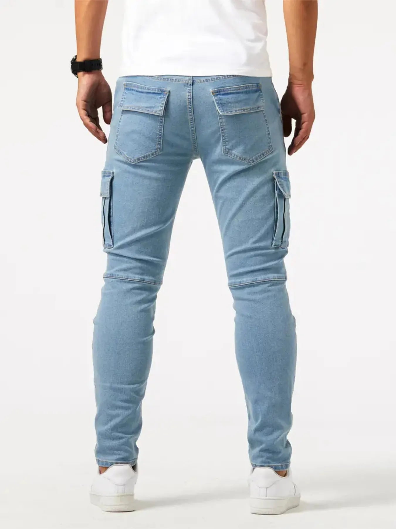 Light blue slim cargo jeans with back patch pockets and cargo seams