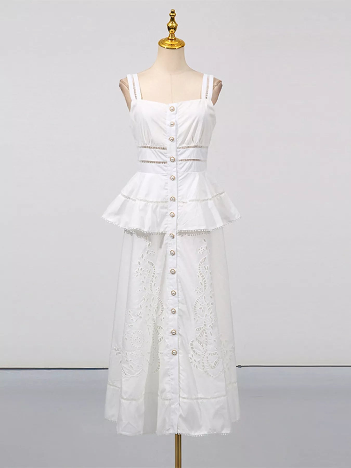 Cedar & Moore sleeveless eyelet embroidered button-down midi dress in white with peplum waist.