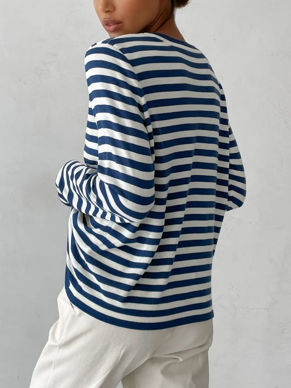 Striped long-sleeve sweater, navy and white stripes with crew neck.