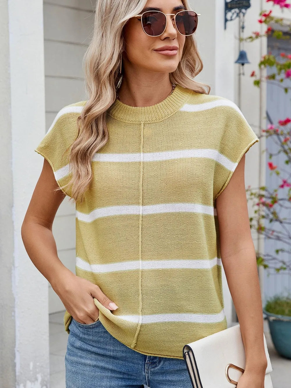 Chartreuse striped knit top with exposed seam, round neck, short sleeves