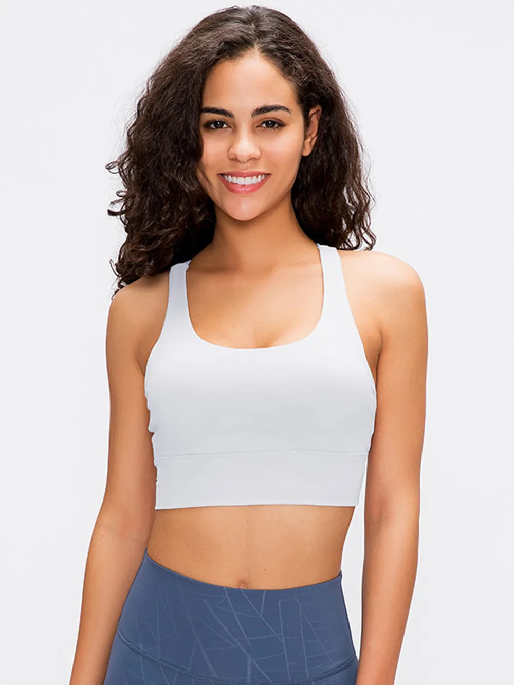 White scoop-neck active tank top with smooth racerback styling