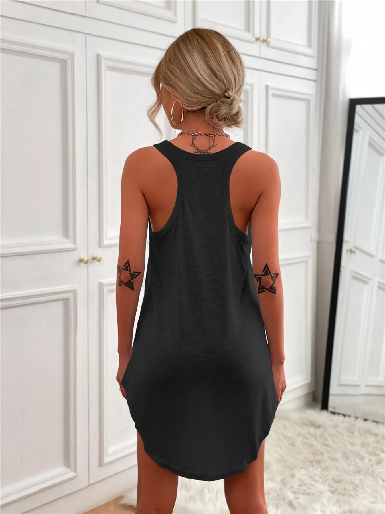 Trendsi casual tank mini dress in black with curved hem, back view