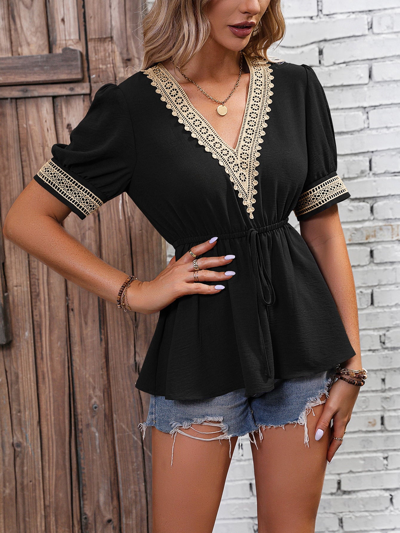 Black contrast V-neck babydoll top with lace trim and cuffed short sleeves
