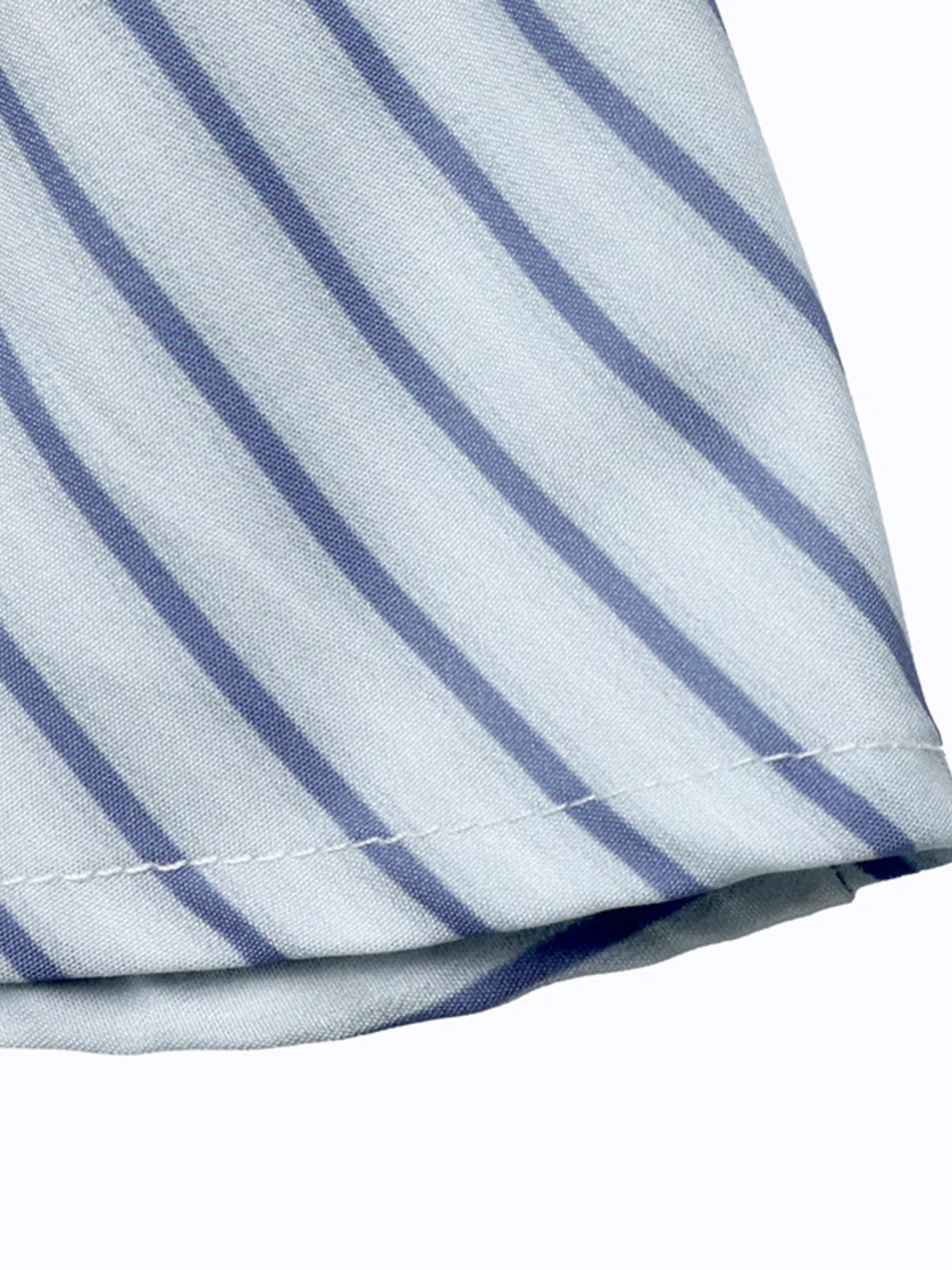 Blue and white striped peplum knot shirt hem with gathered cuff