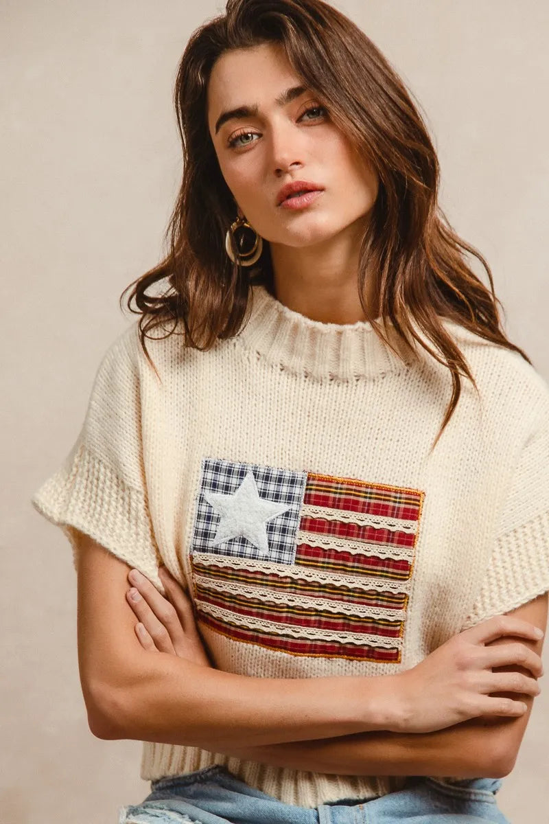 Oatmeal short-sleeve drop-shoulder sweater featuring an American flag patch on front