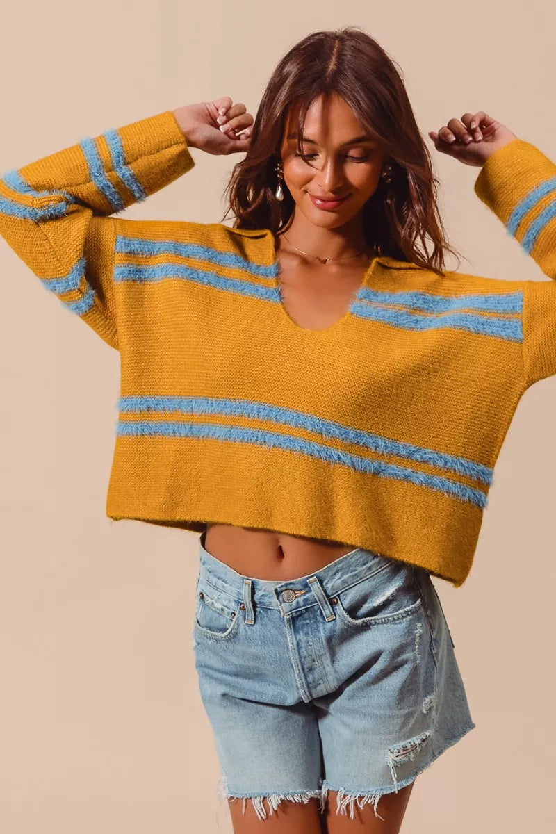 Mustard fuzzy deep U neck sweater with light blue horizontal stripes and striped sleeves