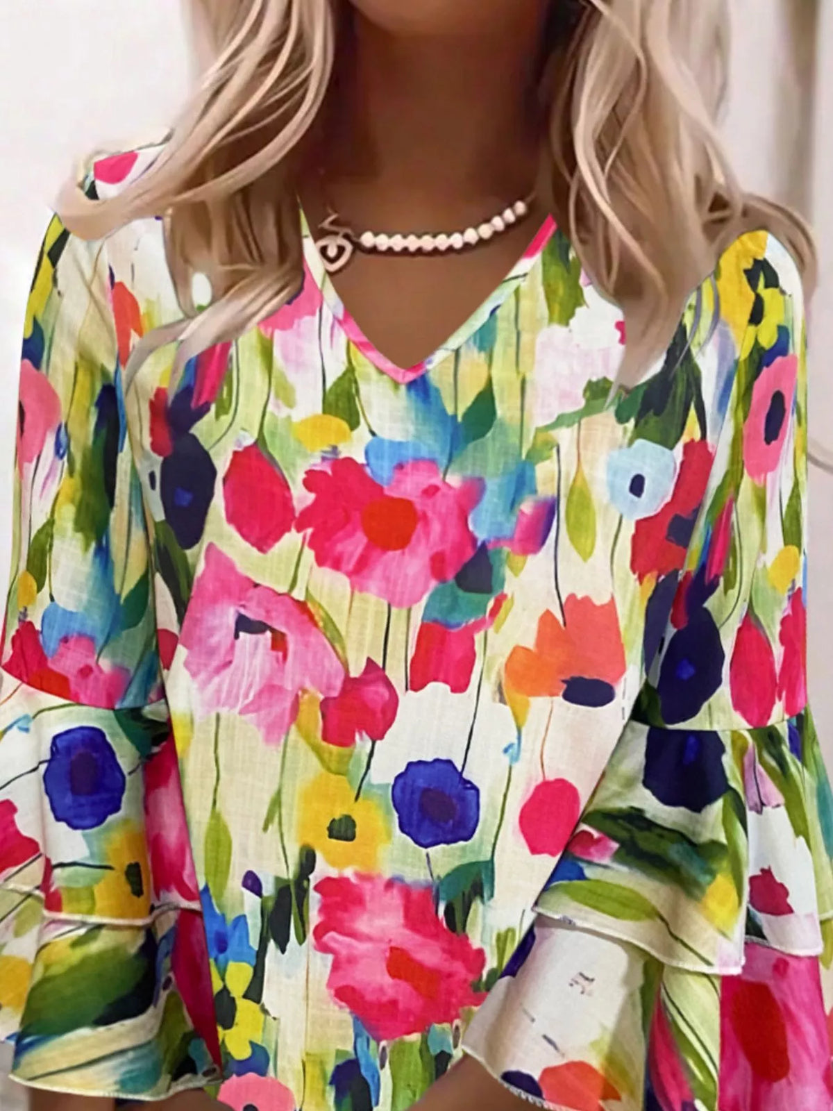 Multicolor floral mini dress with V-neckline and tiered ruffle sleeves
