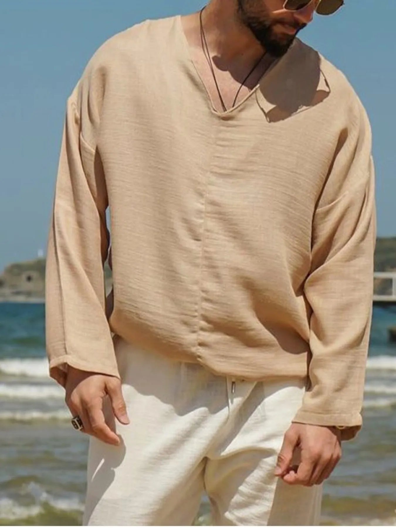 Beige V-neck long sleeve men’s plus-size top with soft textured fabric