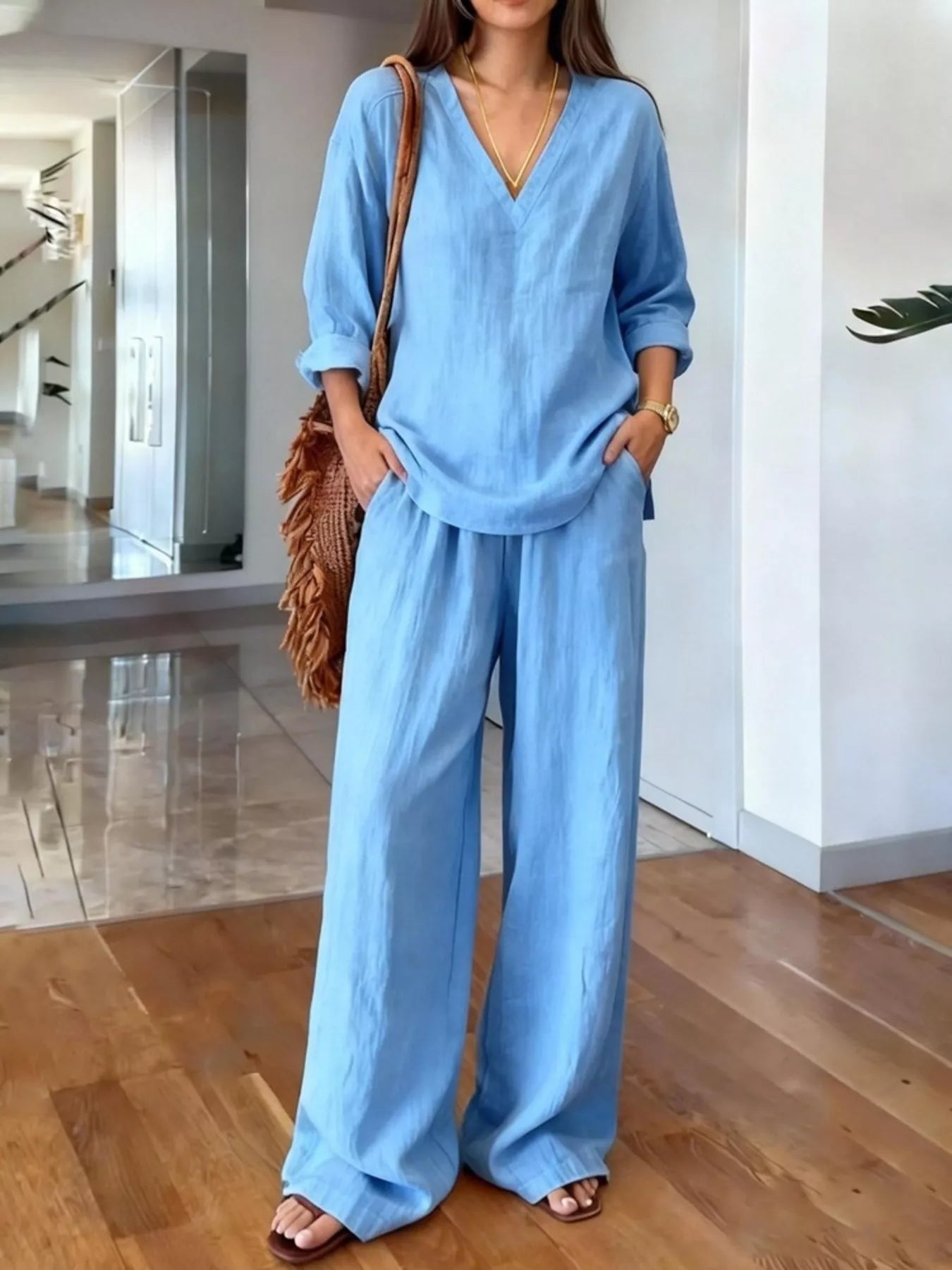 V-neck top and wide-leg pants set in light blue, relaxed V-neck top with wide-leg pants
