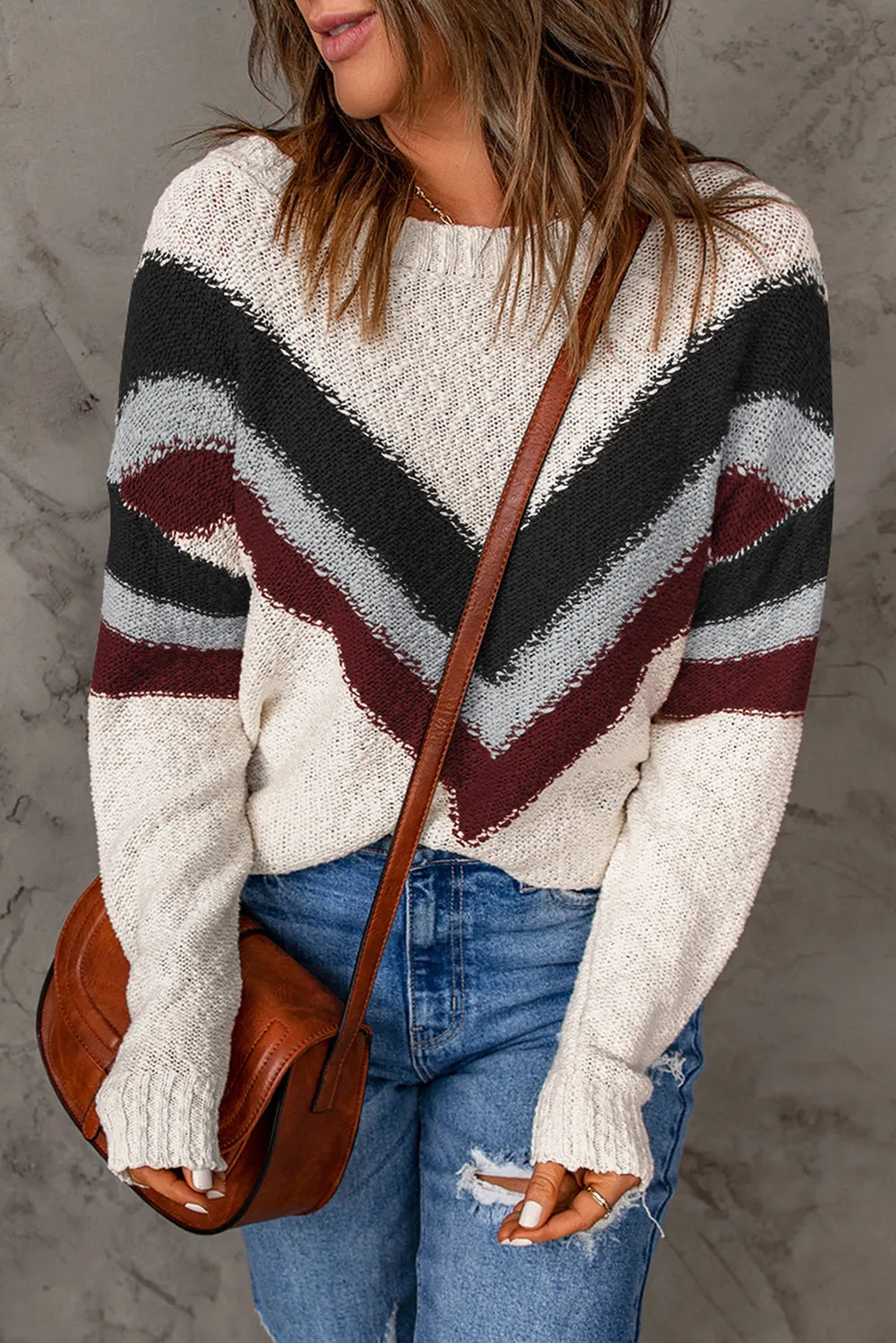 Contrast chevron knit sweater, cream with black and burgundy stripe pattern and ribbed cuffs